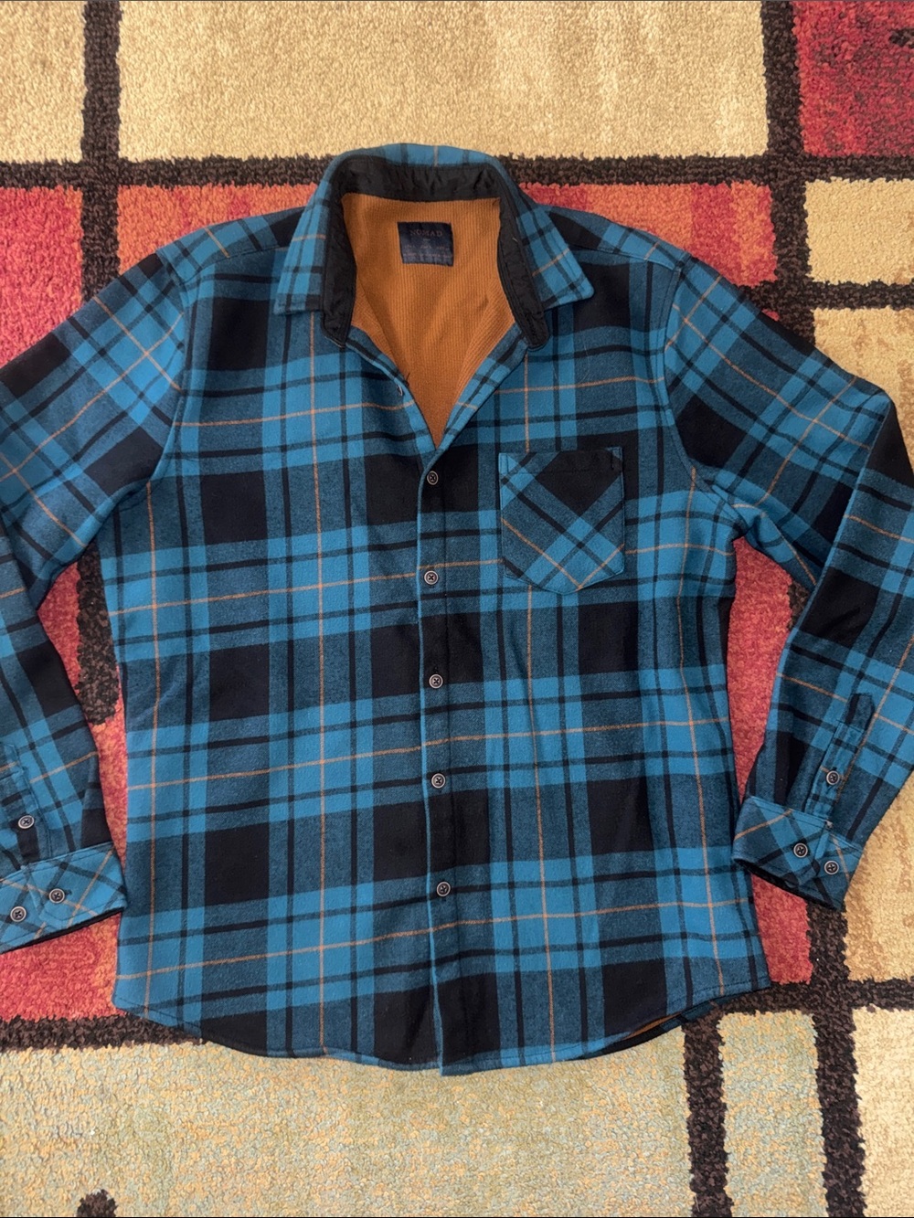 Nomad‎ brand blue and black plaid flannel shirt